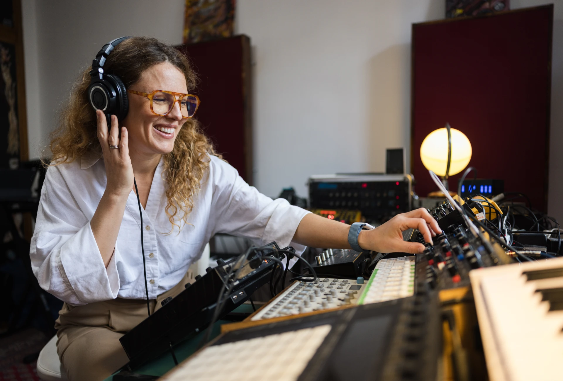 Female sound engineer working in studio